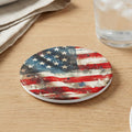 Rustic American flag design on a round coaster.
